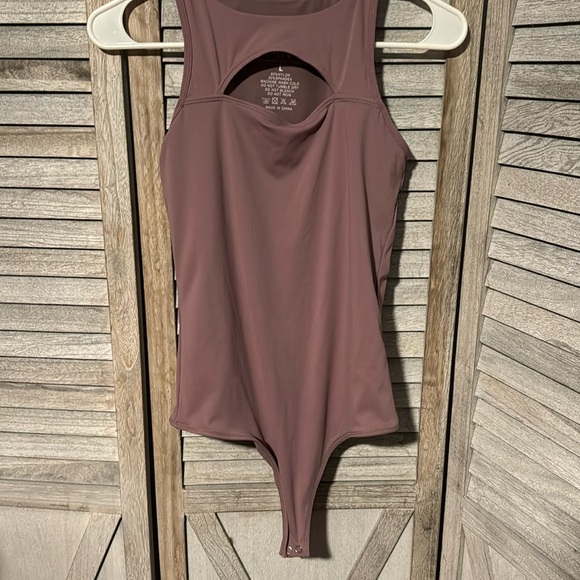 Klassy Network Tops - Klassy Network bramisuit  with peek hole on front, snaps on bottom, pre owned